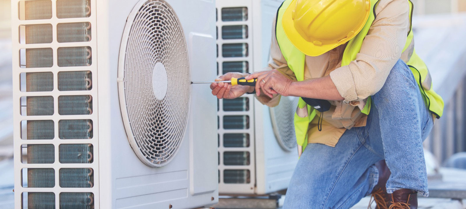 Man Fixing Hvac Unit Man Fixing Hvac Unit