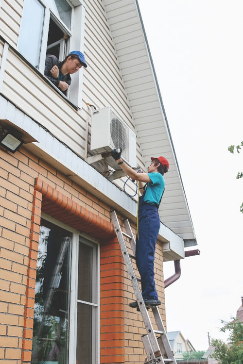People Servicing Ac Unit People Servicing Ac Unit